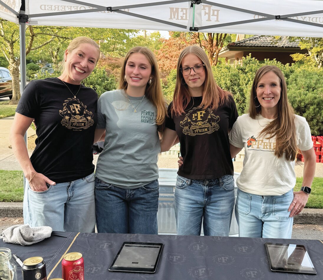 Four women from pFriem Beer at the beer booth.